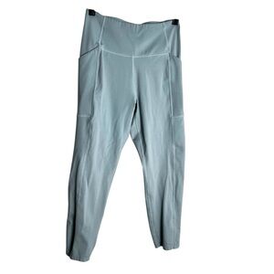 Girlfriend Collective compressive high-rise cropped leggings size: M light blue